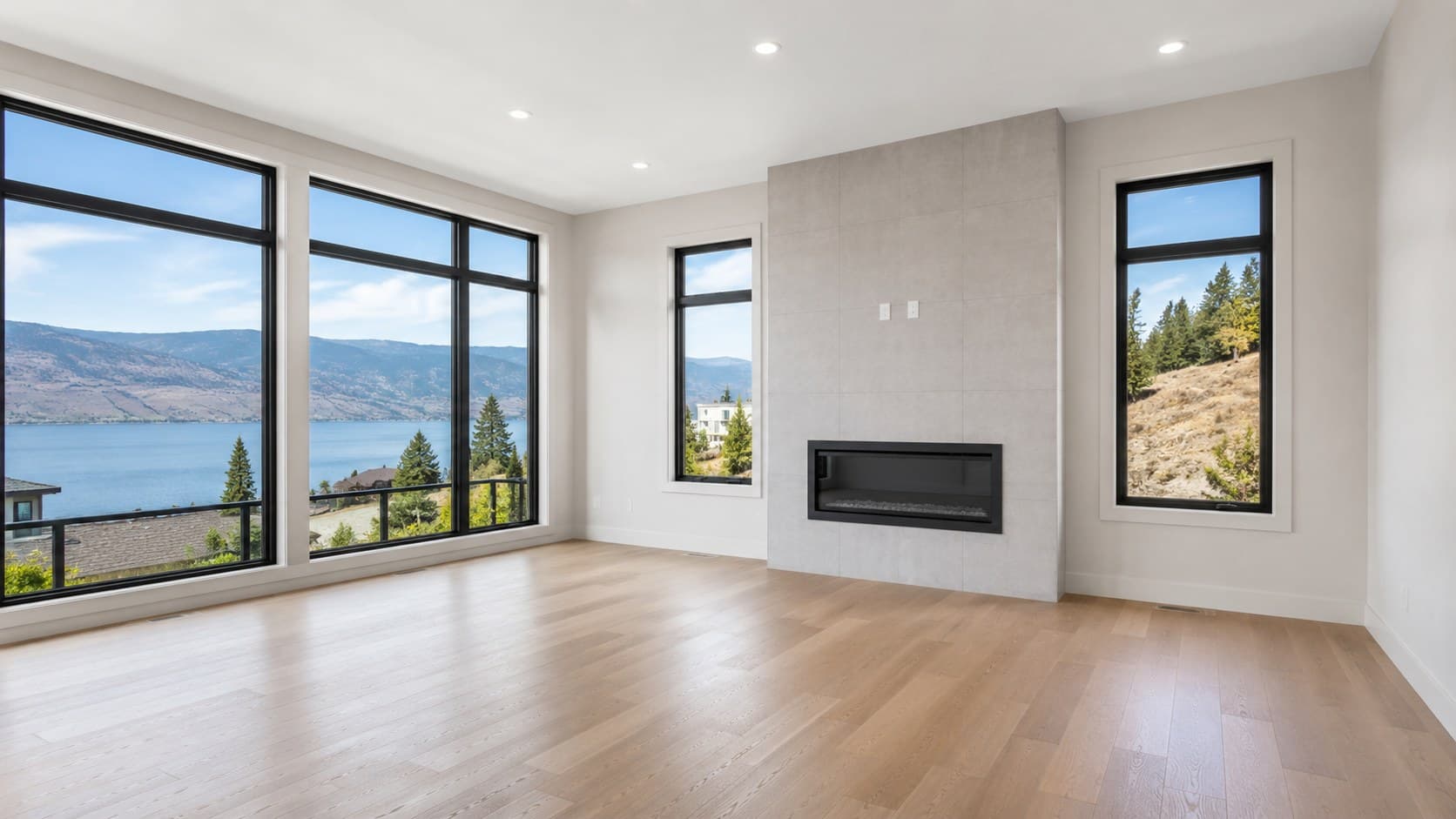 Lake-view living room — Kelowna before virtual staging